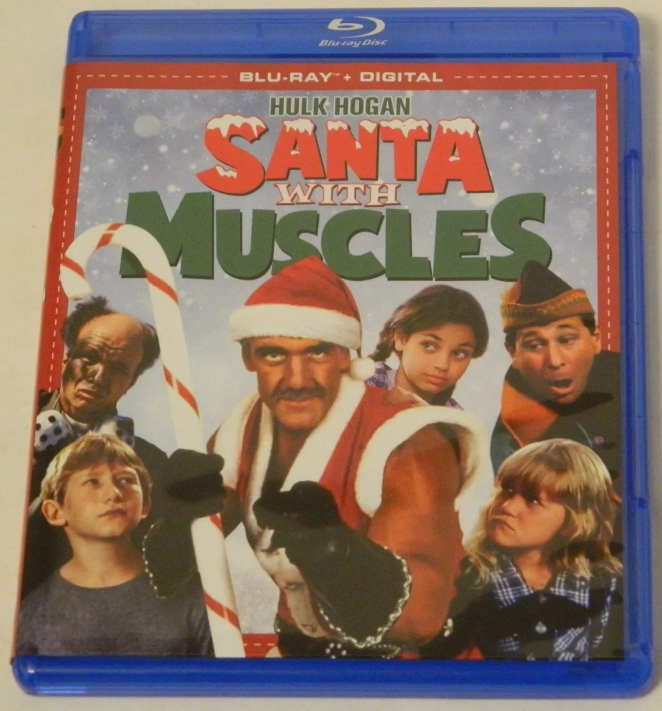 https://www.geekyhobbies.com/wp-content/uploads/2019/12/Santa-With-Muscles-Blu-ray.jpg.webp