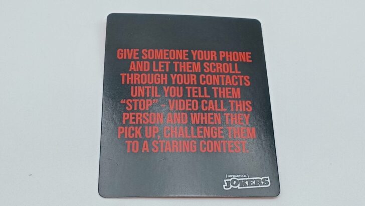 Using a Punishment card in Impractical Jokers Game Box of Challenges